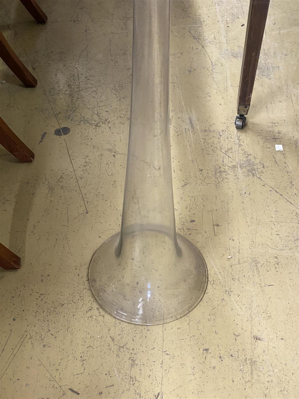 A tall fluted glass vase, height 142cm, width 27cm